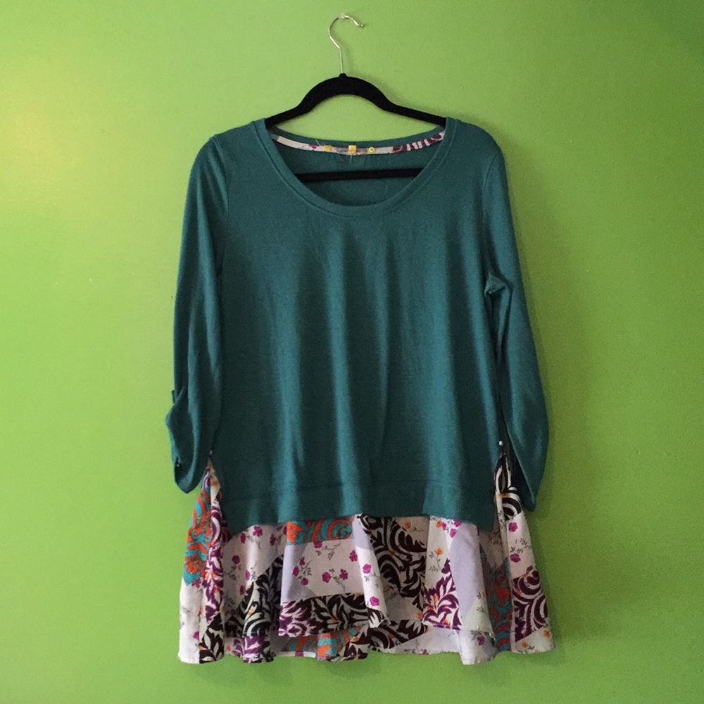 Blue shirt with unique bottom